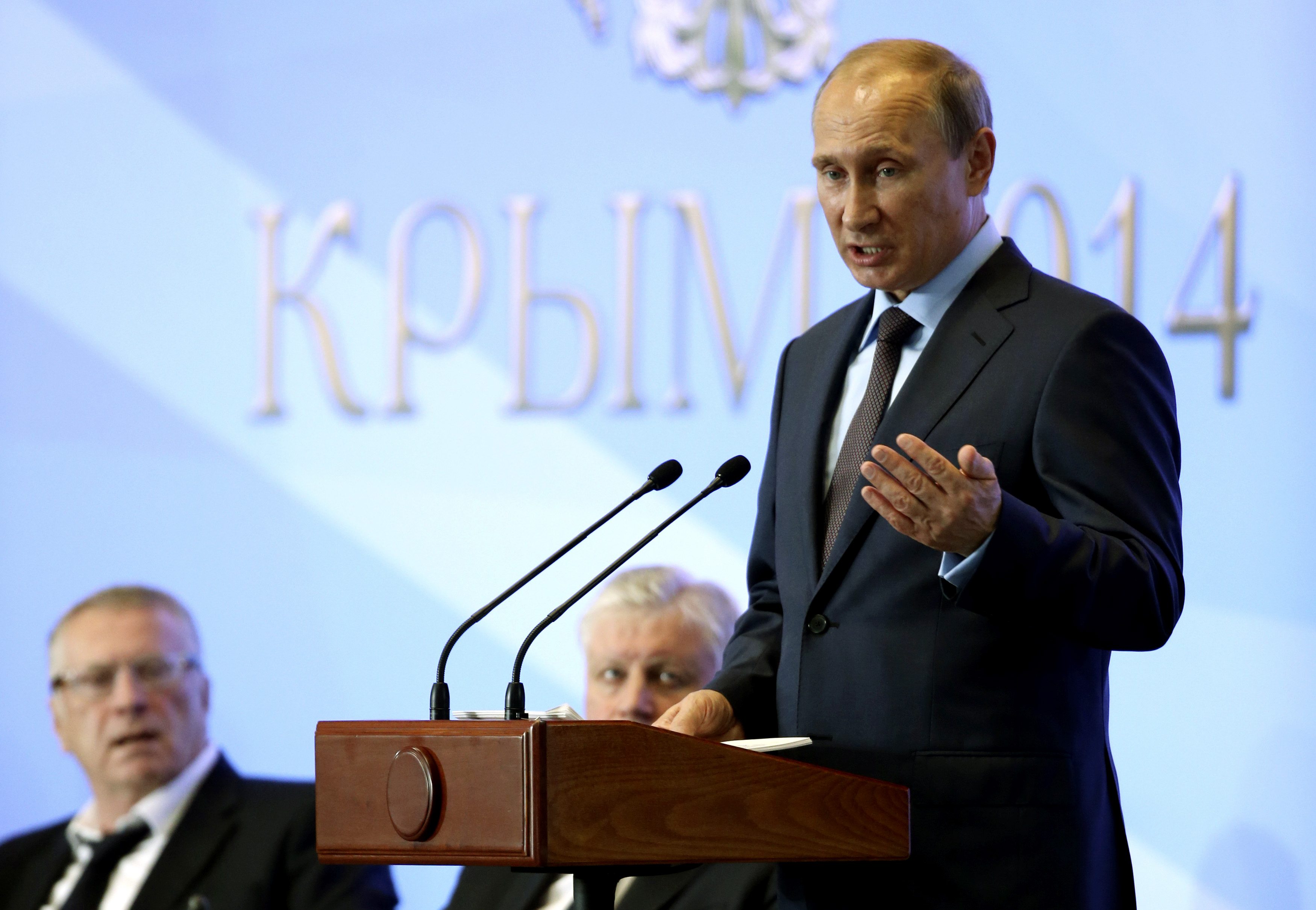 Russian President Vladimir Putin delivers a speech during a meeting with deputies of the Russian Parliament and other politicians and officials near Yalta